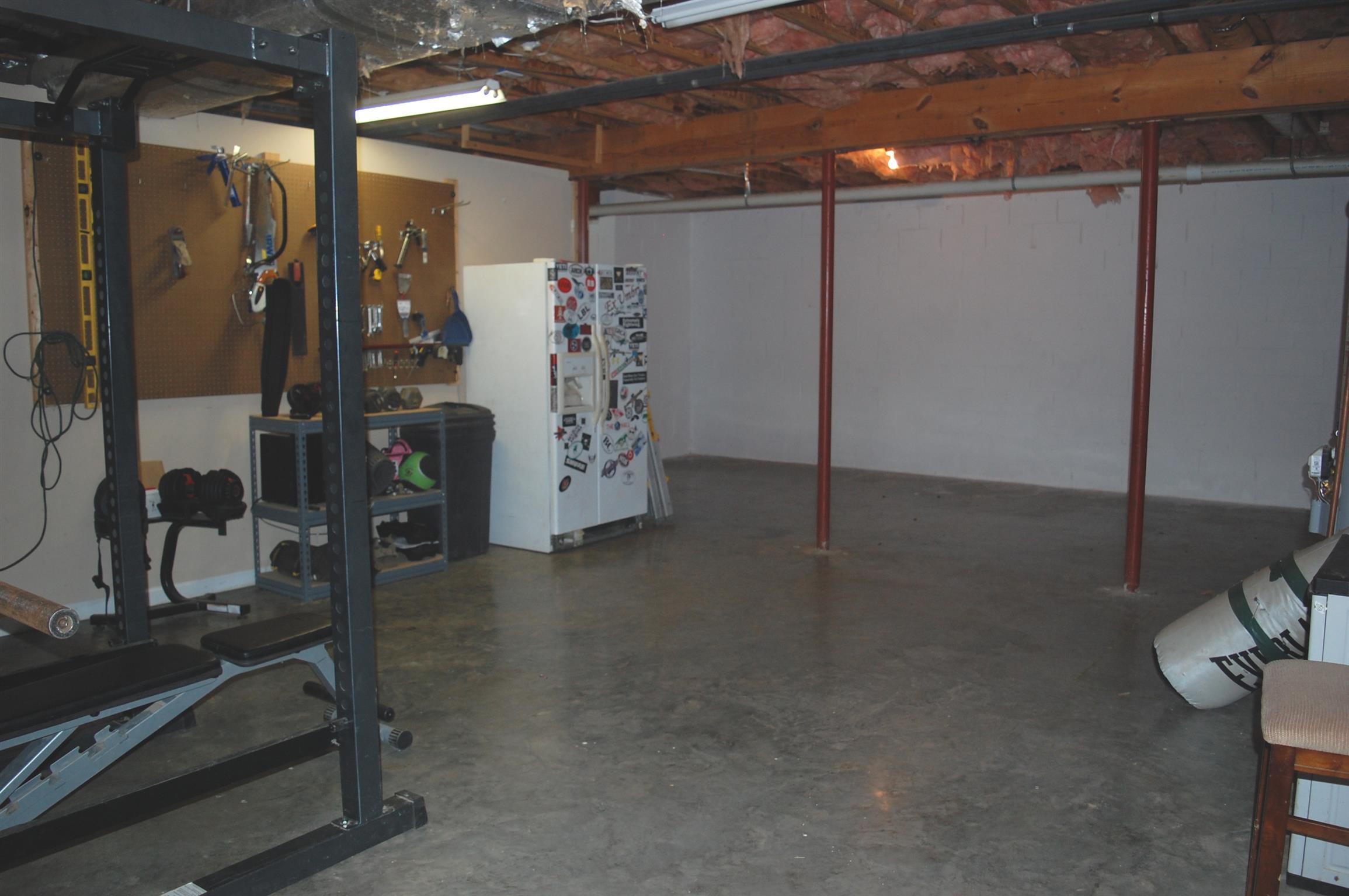 545 Pond Apple Road Clarksville, TN 37043 - Photo 20 of 22 The Unfinished Basement Is Ready For You To Customize! Bring Your Work Bench, Exercise Equipment, or Storage Shelves!