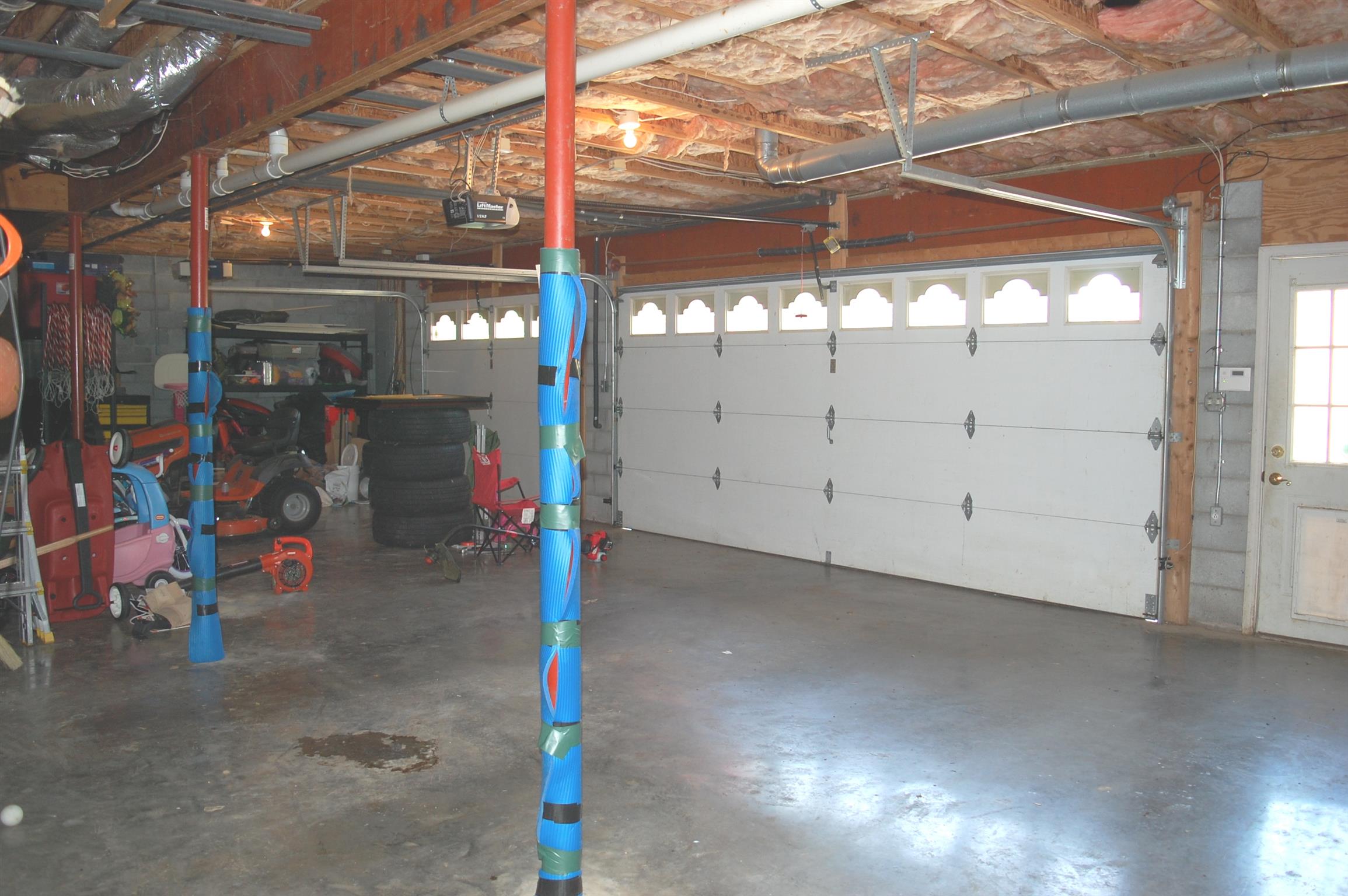 545 Pond Apple Road Clarksville, TN 37043 - Photo 21 of 22 There's Plenty of Room in this 3 Car Garage! - Ready for Your Trucks and Toys!