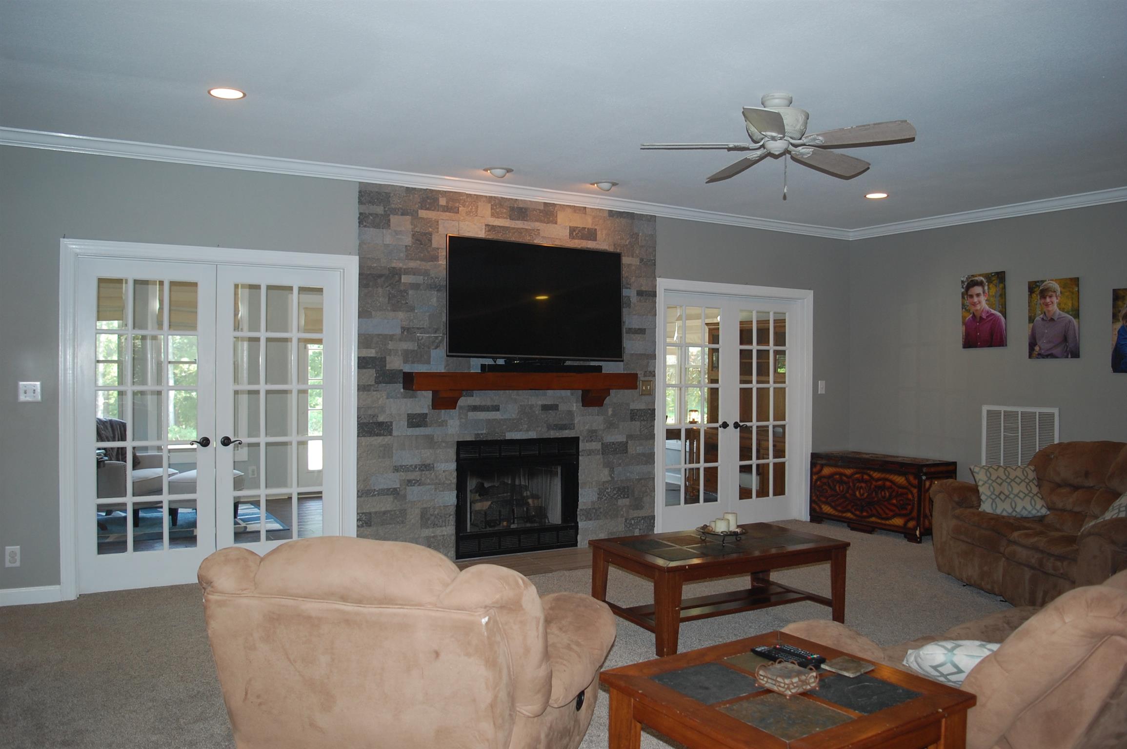 545 Pond Apple Road Clarksville, TN 37043 - Photo 5 of 22 Enjoy Family Time in this Large Living Room Complete With a Stunning Fireplace!