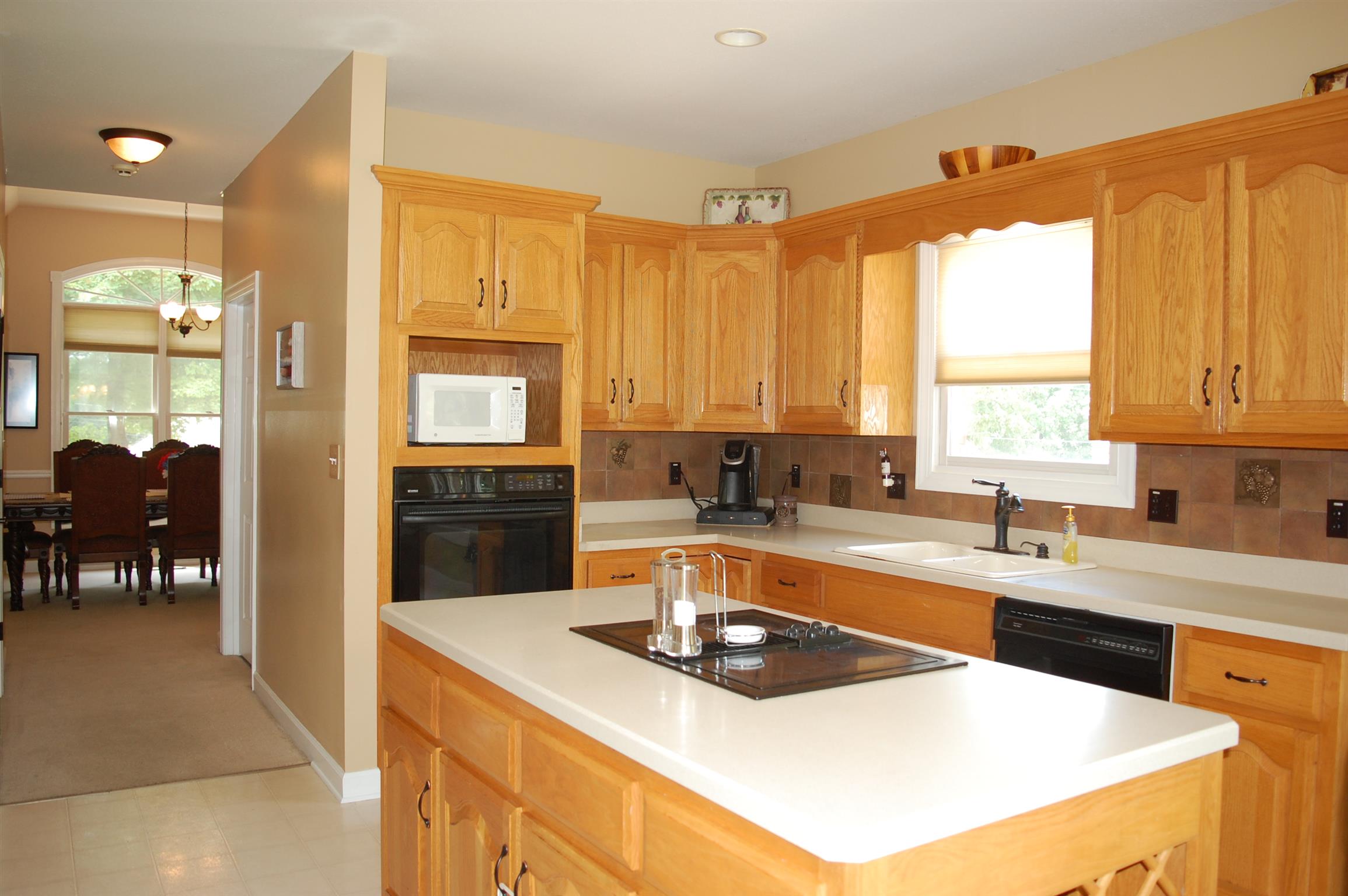 545 Pond Apple Road Clarksville, TN 37043 - Photo 7 of 22 This Kitchen Is Perfect For Your Aspiring Chefs - Long Island & Electric Stove Provides Tons Of Counter Space!