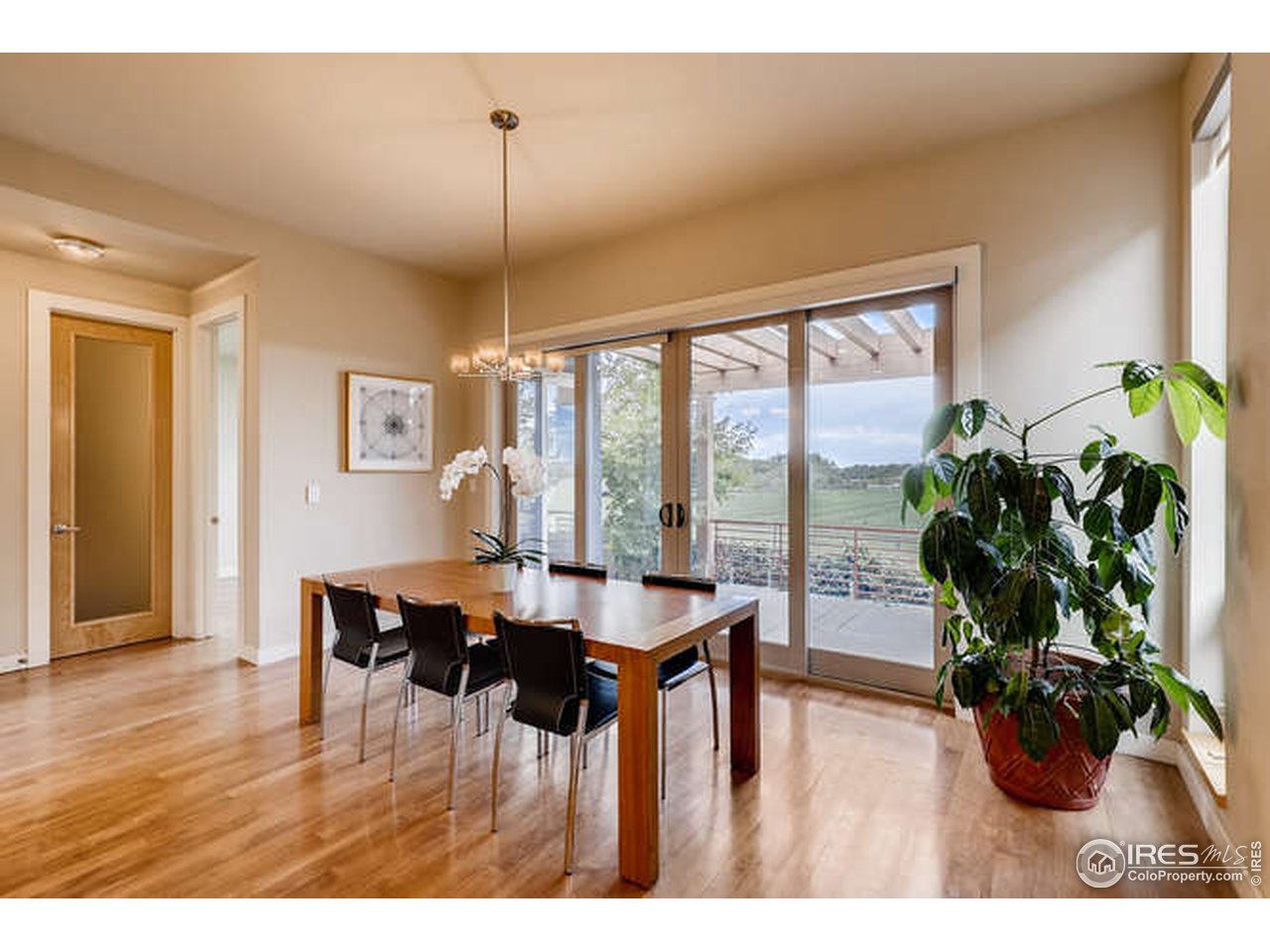 3784 Ridgeway Street Boulder, CO 80301 - Photo 11 of 40 French sliding doors open wide to pergola/backyard