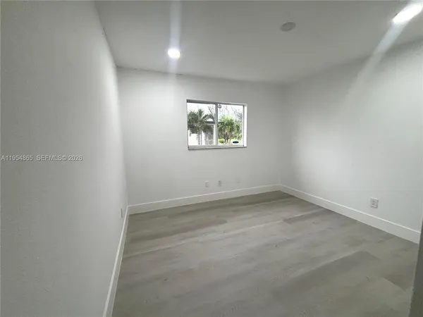 an empty room with a window