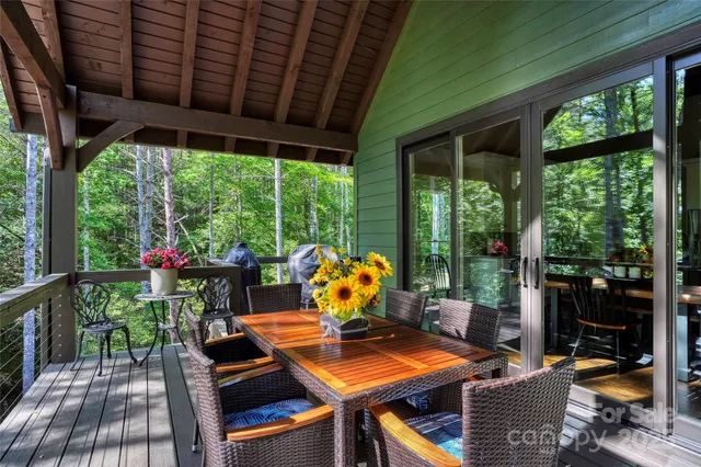 a view of an outdoor dining space with furniture