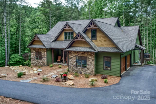 a front view of house with yard outdoor seating and green space
