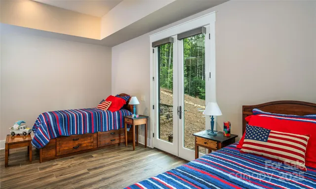 a bedroom with furniture and a window