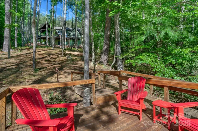 a view of a two chairs in the patio