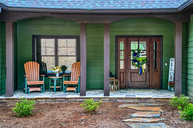 a front view of a house with a porch