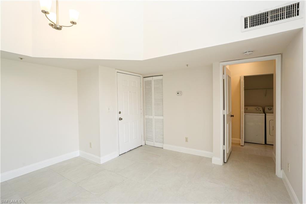 1265 Wildwood Lakes Boulevard, Unit 3306 Naples, FL 34104 - Photo 13 of 39 a view of an empty room