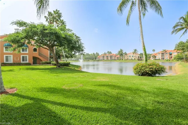 a house with swimming pool in front of it