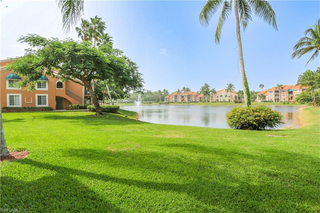 1265 Wildwood Lakes Boulevard, Unit 3306 Naples, FL 34104 - Photo 34 of 39 a house with swimming pool in front of it