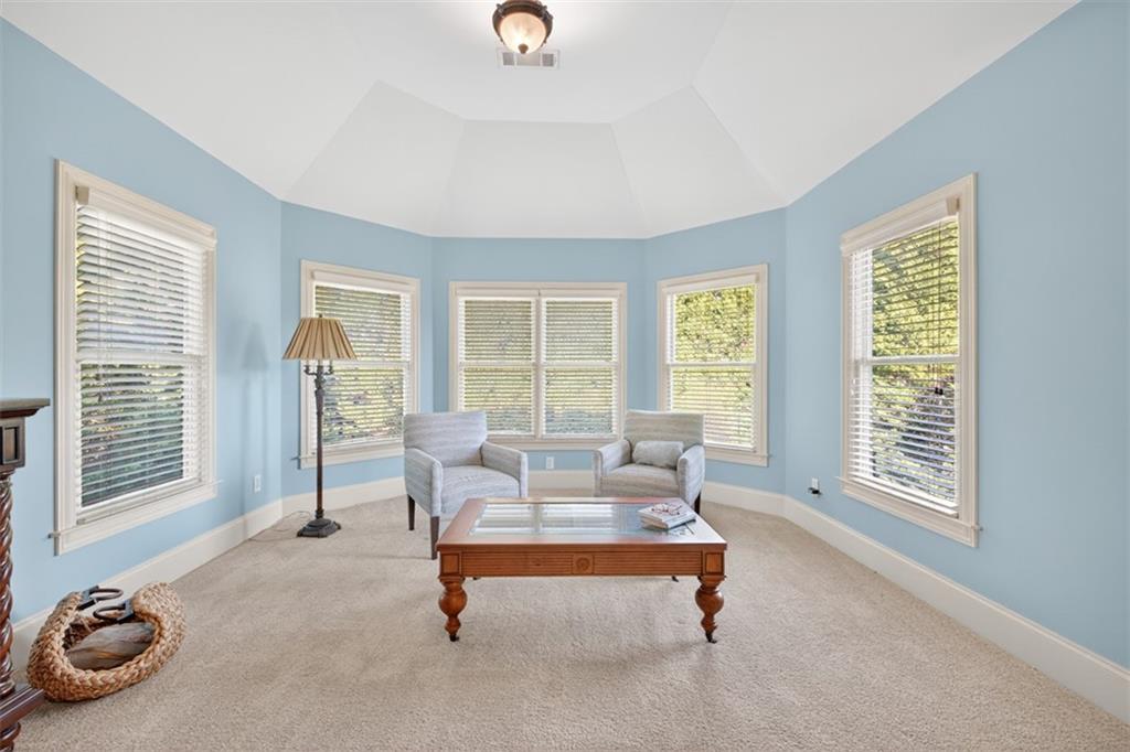 909 Pathview Court Dacula, GA 30019 - Photo 42 of 113 a living room with furniture and a window