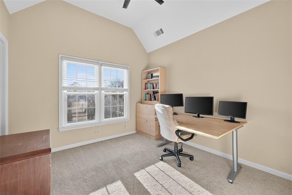 909 Pathview Court Dacula, GA 30019 - Photo 56 of 113 a view of a workspace with furniture and a window