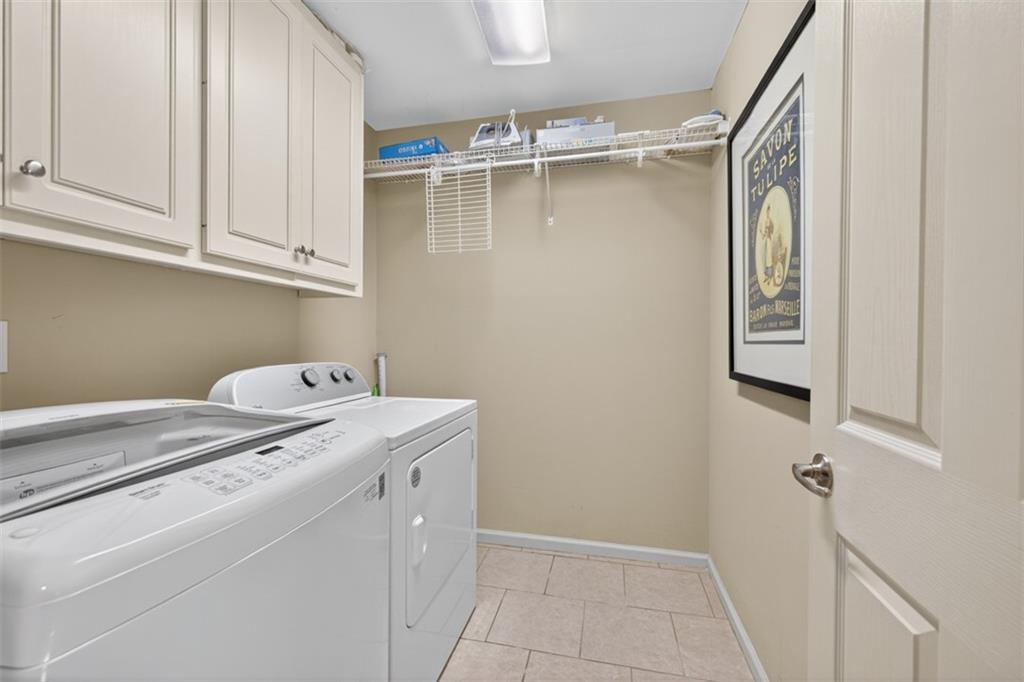 909 Pathview Court Dacula, GA 30019 - Photo 66 of 113 a utility room with dryer and washer