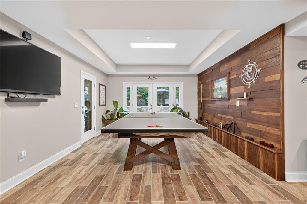 909 Pathview Court Dacula, GA 30019 - Photo 76 of 113 a room with furniture pool table and flat screen tv