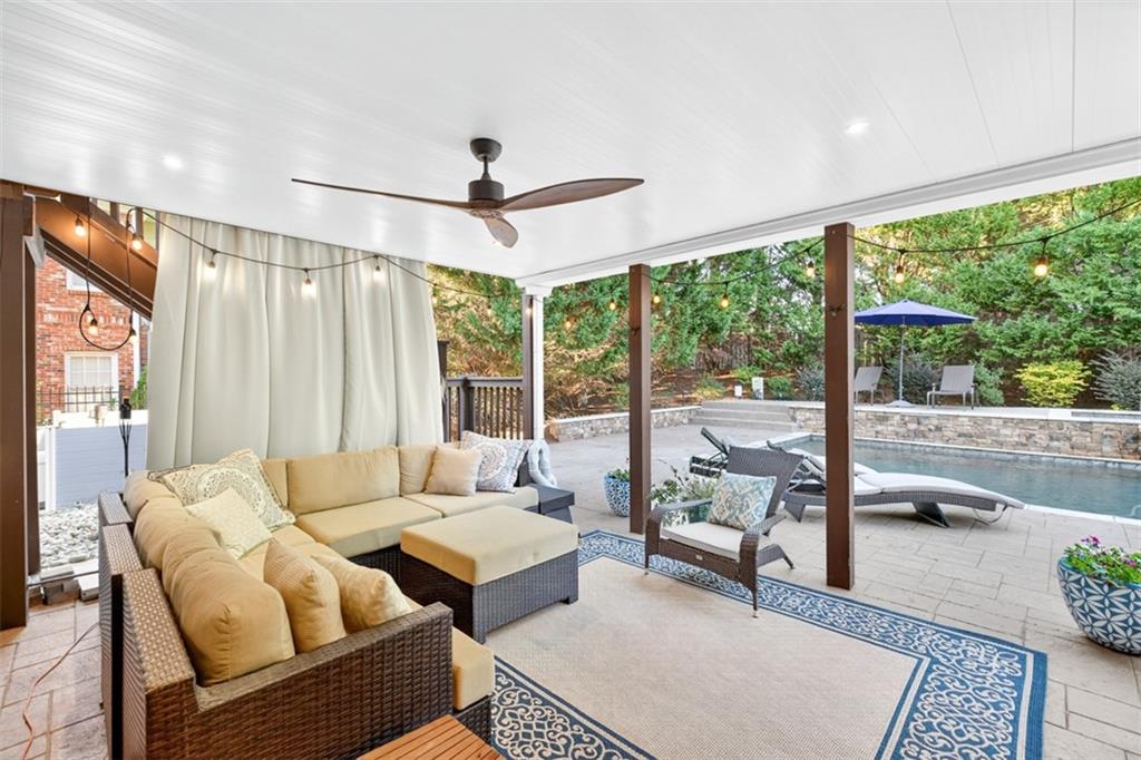 909 Pathview Court Dacula, GA 30019 - Photo 83 of 113 a living room with furniture and a large window
