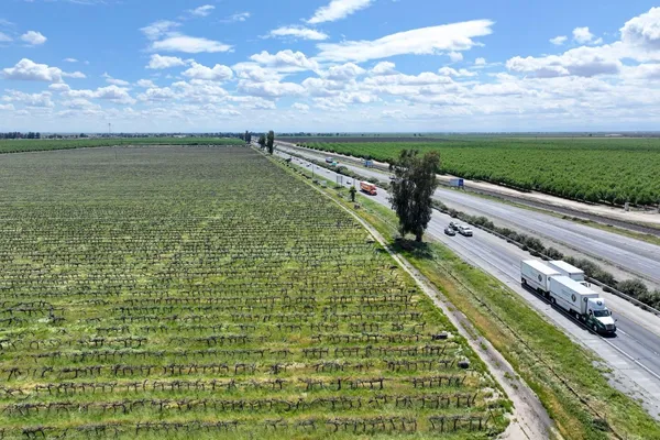 a view of a lake with a big yard