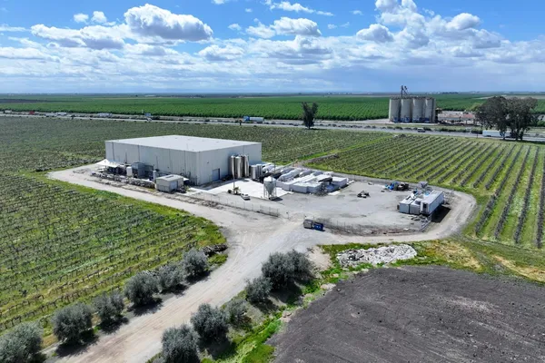 a view of a lake with a yard