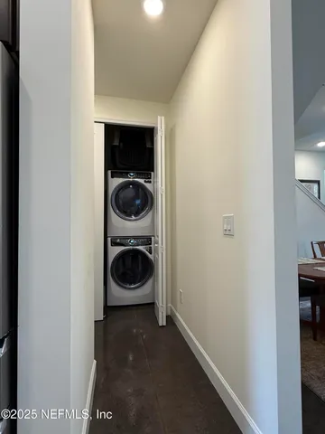 a bedroom with a bed and a chair