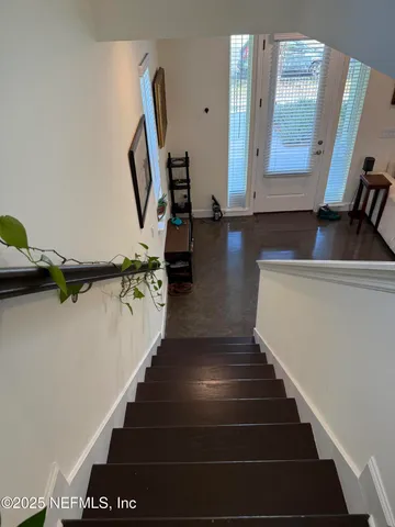 a view of a house with a street
