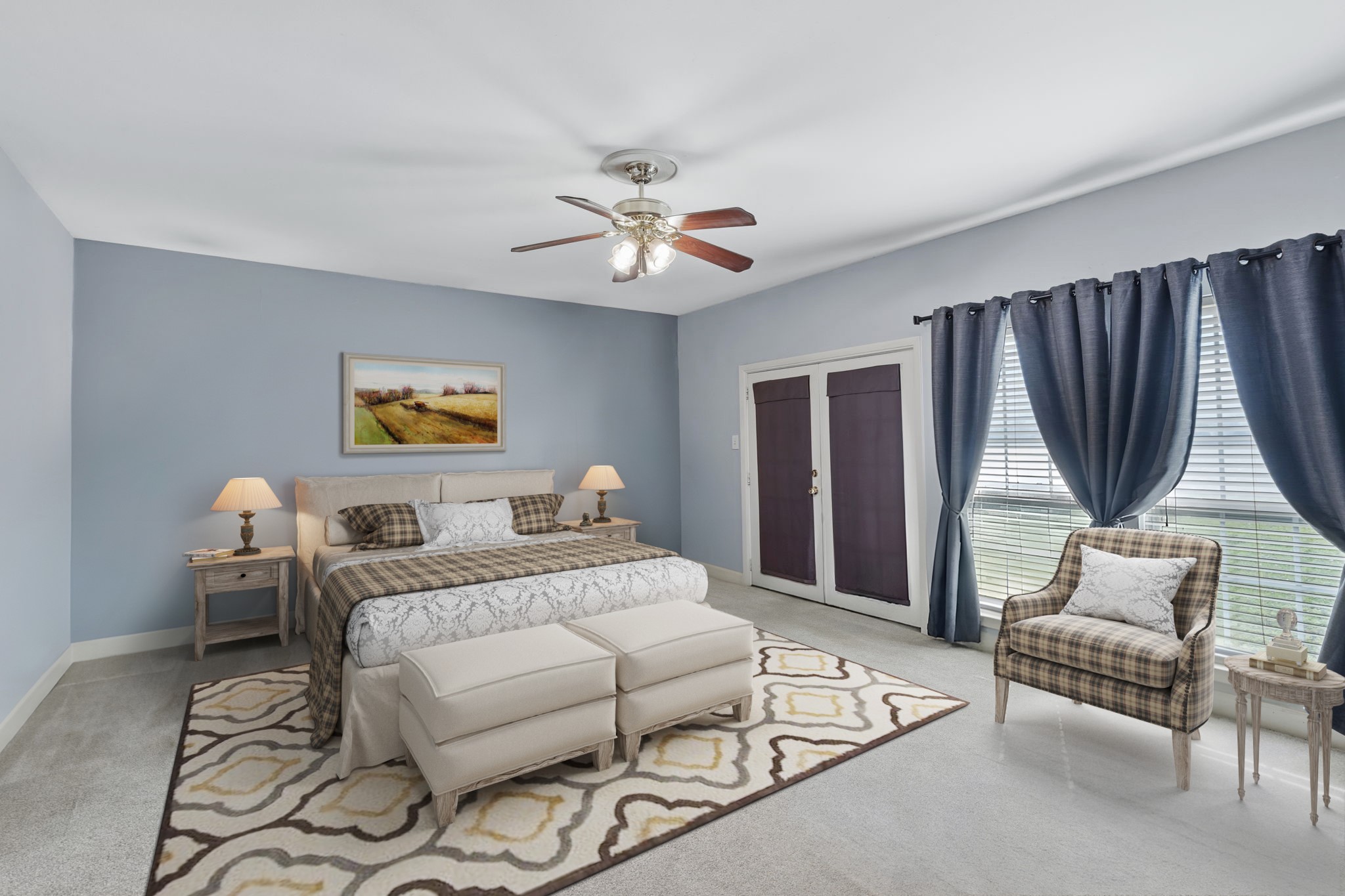 2935 West Fm 1462 Rosharon, TX 77583 - Photo 21 of 50 Virtually Staged: This serene ranch primary bedroom offers a comfortable retreat designed for rest after long days outdoors. Soft blue walls and abundant natural light create a calm, airy atmosphere, while the ceiling fan adds everyday comfort.