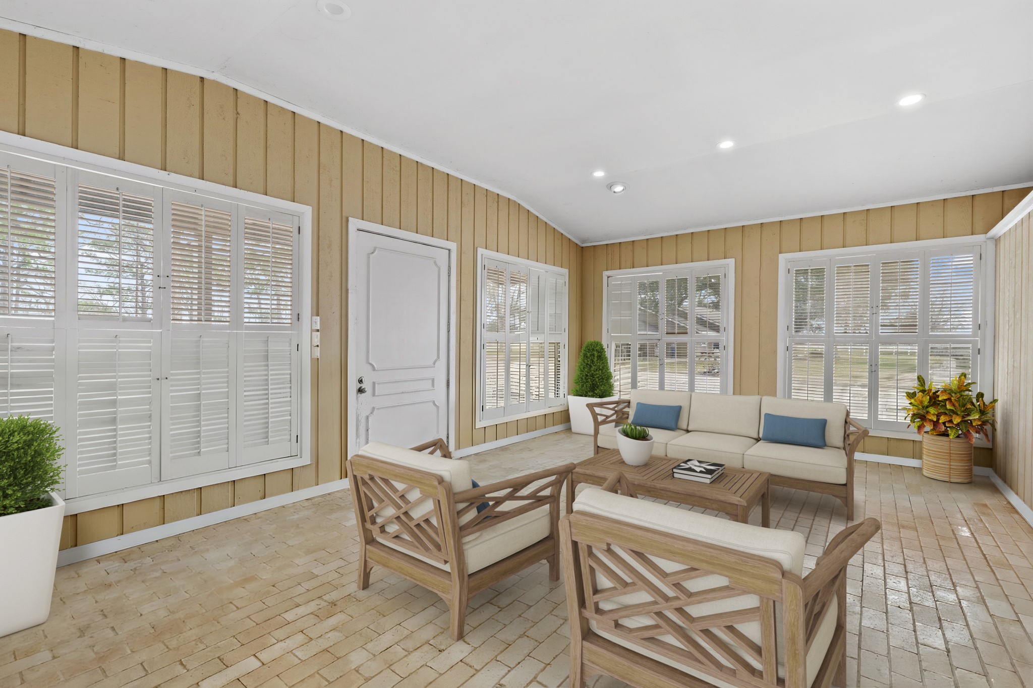 2935 West Fm 1462 Rosharon, TX 77583 - Photo 40 of 50 Virtually Staged: With its simple finishes, open layout, and low-maintenance design, this pool house living room serves as a laid-back extension of the ranch, built for comfort, convenience, and connection.