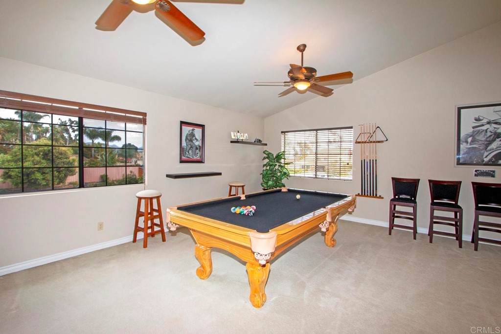 14866 Oakline Road Poway, CA 92064 - Photo 31 of 49 a living room with furniture pool table and a window