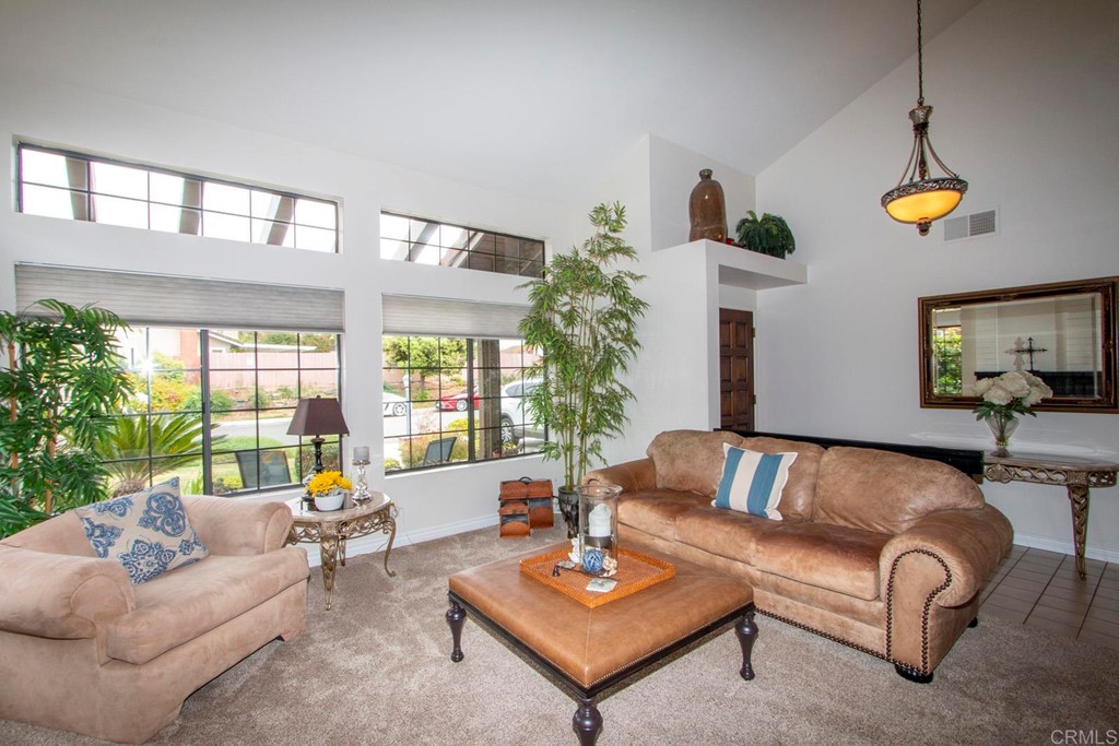 14866 Oakline Road Poway, CA 92064 - Photo 8 of 49 a living room with furniture and a large window