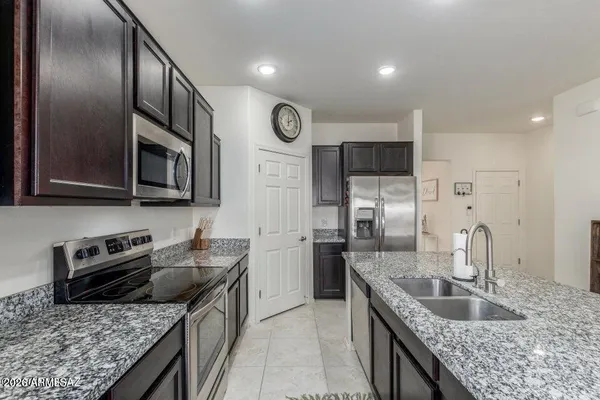 a bathroom with a sink toilet and a mirror