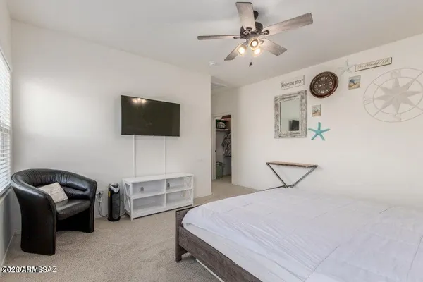 a bathroom with a double vanity sink mirror and shower