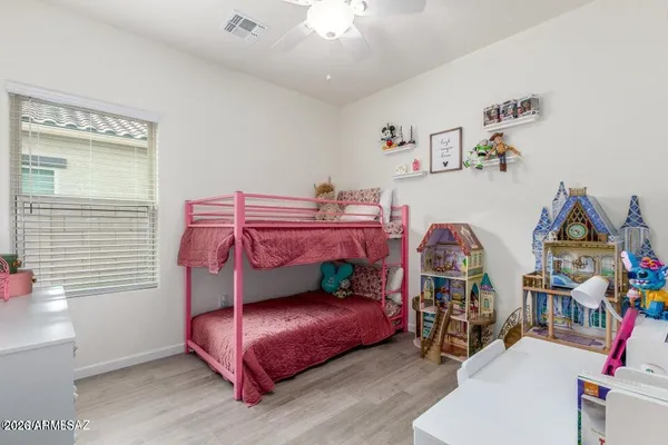 a room with toys and a shelf