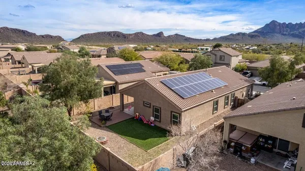 an aerial view of a house with a garden