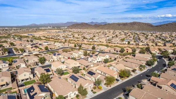 an aerial view of residential building with city view