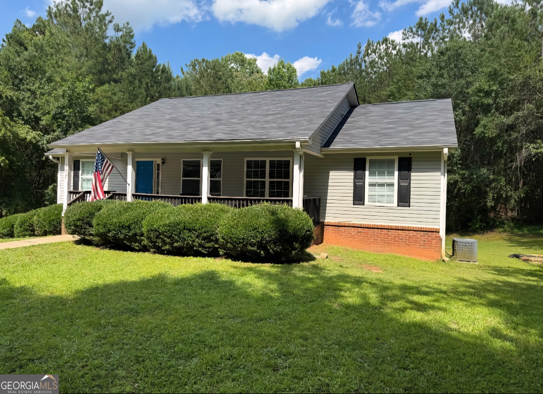 177 Jack Russell Road Newnan, GA 30263 - Photo 1 of 1 a front view of a house with a yard