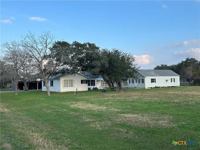 a view of yard with an outdoor space
