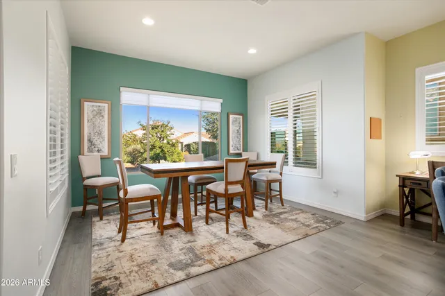 a kitchen with stainless steel appliances white cabinets and a sink