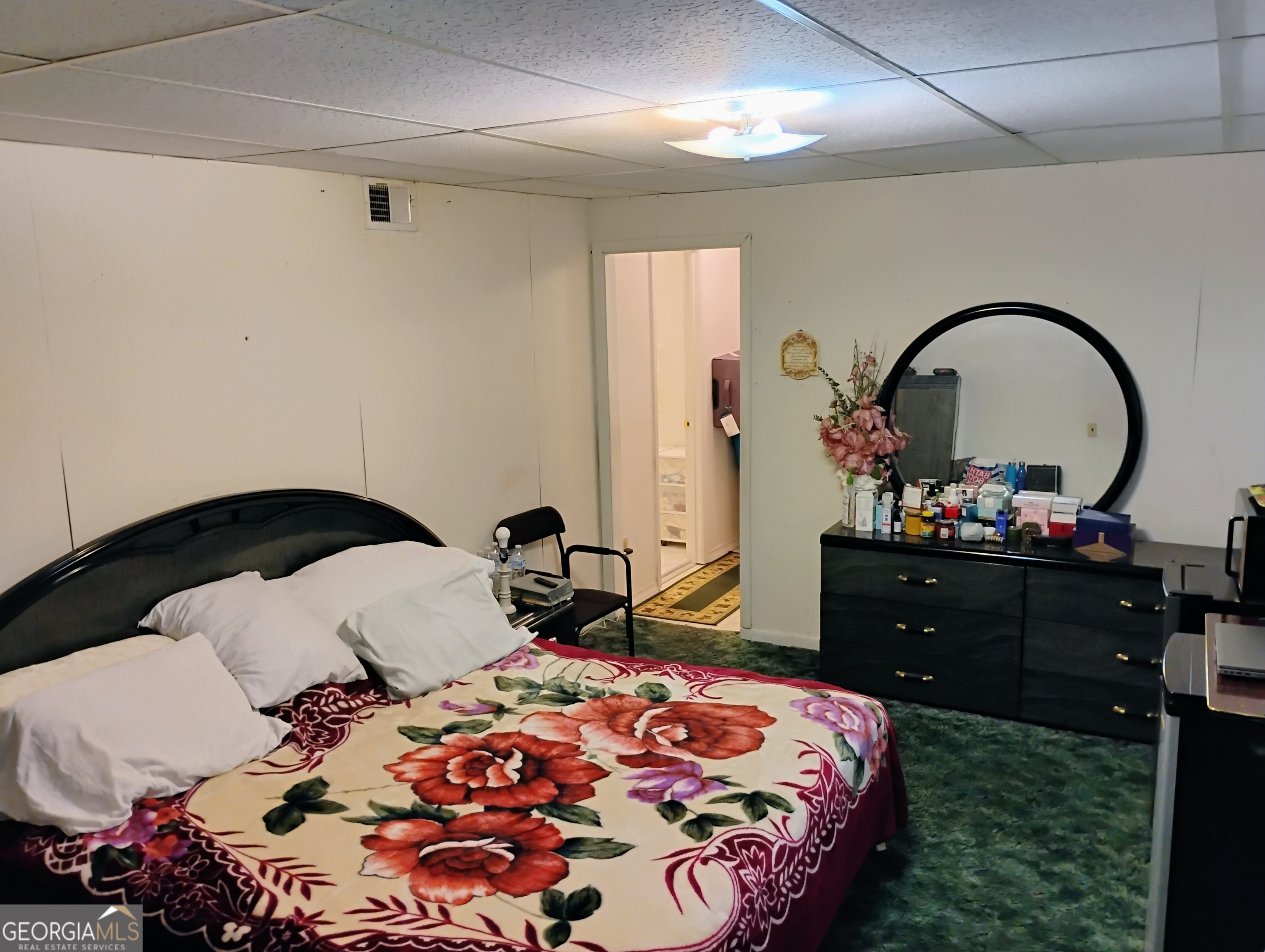 6501 River Run Road Riverdale, GA 30274 - Photo 13 of 18 a bedroom with a bed and a dresser