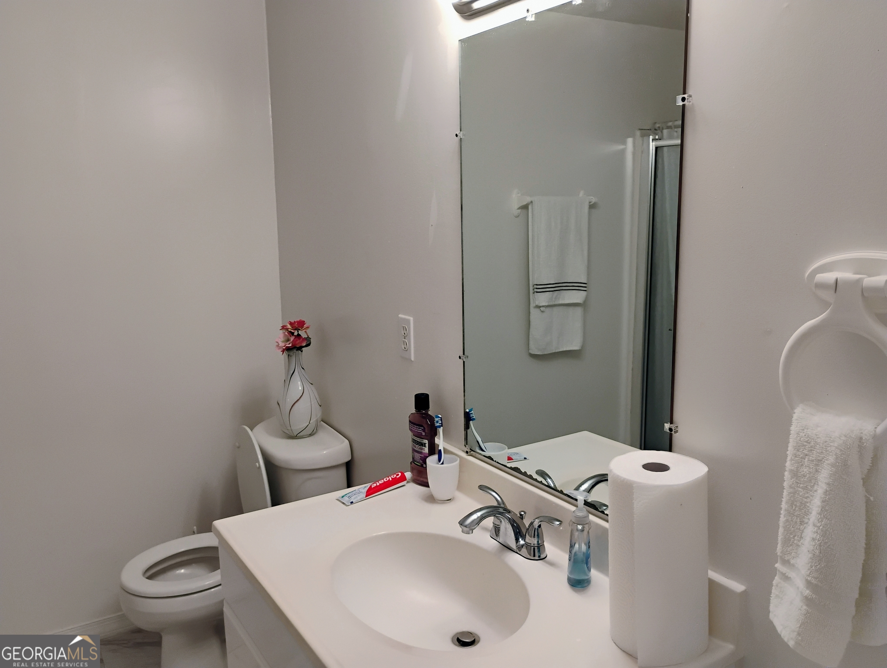 6501 River Run Road Riverdale, GA 30274 - Photo 10 of 18 a bathroom with a sink and a toilet