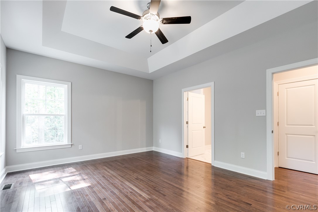 3663 West Rocketts Ridge Road Goochland, VA 23063 - Photo 24 of 33 wooden floor in an empty room with a window