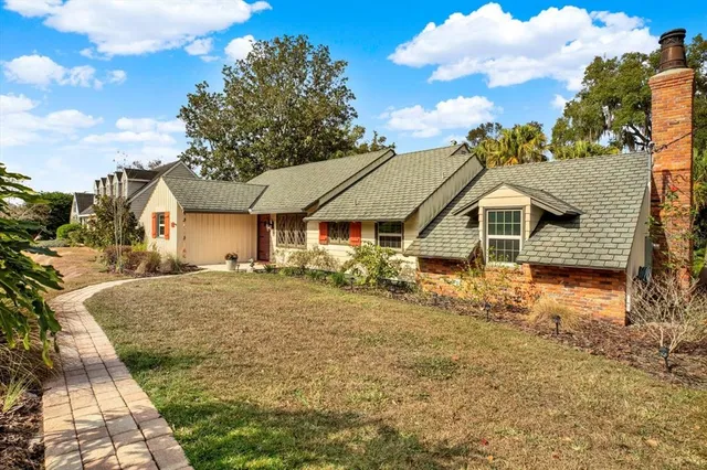 a front view of house with yard