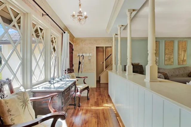 a view of a living room and kitchen