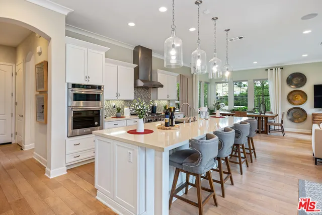 a spacious bedroom with a bed and a window