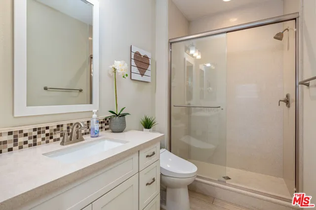 a view of a house with a yard and garden