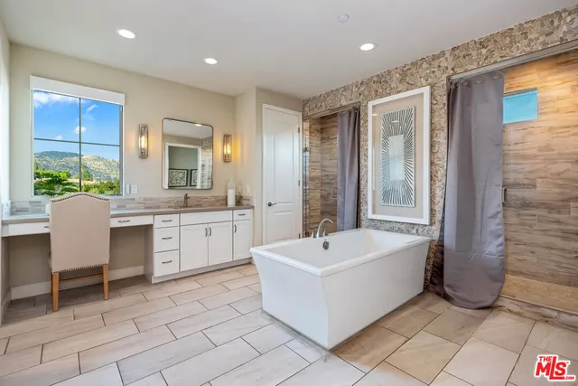 an aerial view of a house with a garden