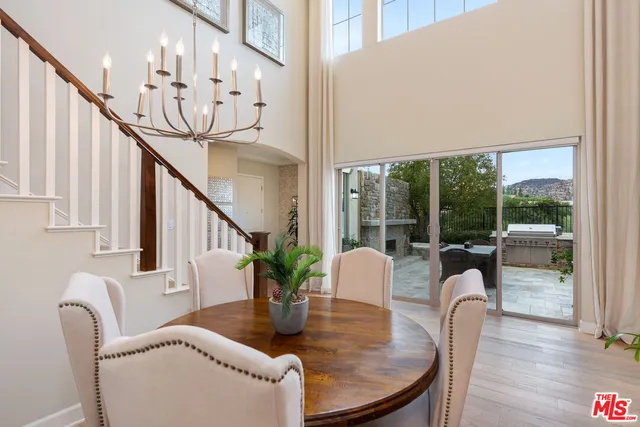 a view of a workspace with furniture