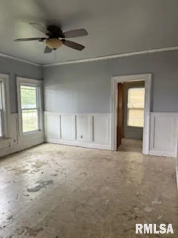 an empty room with windows
