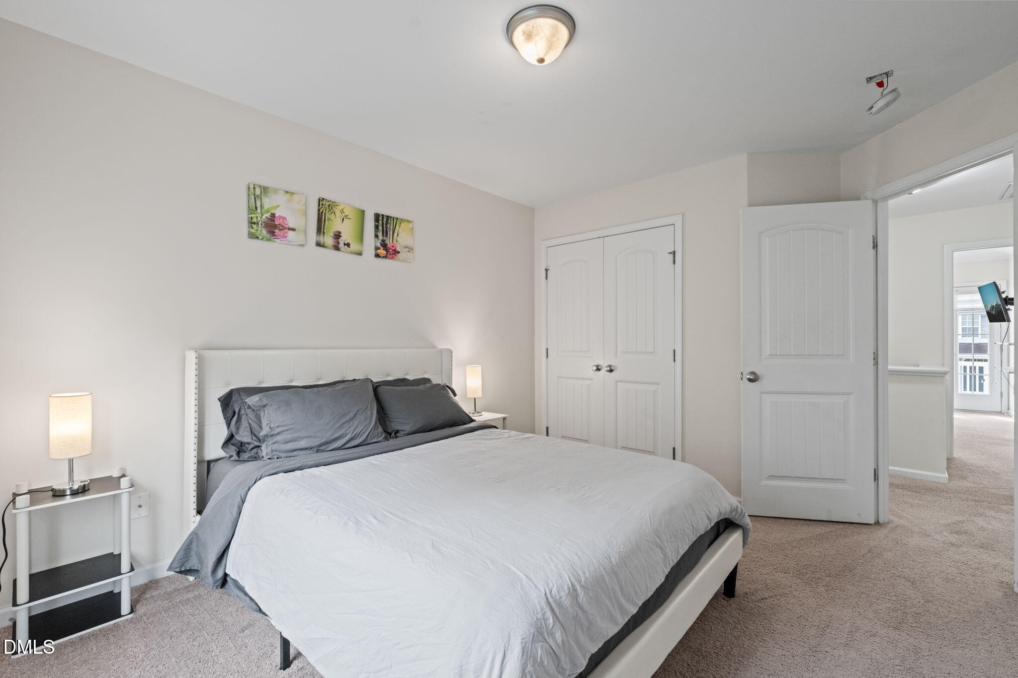 5841 Wynmore Road Raleigh, NC 27610 - Photo 26 of 40 a bedroom with a bed and a window