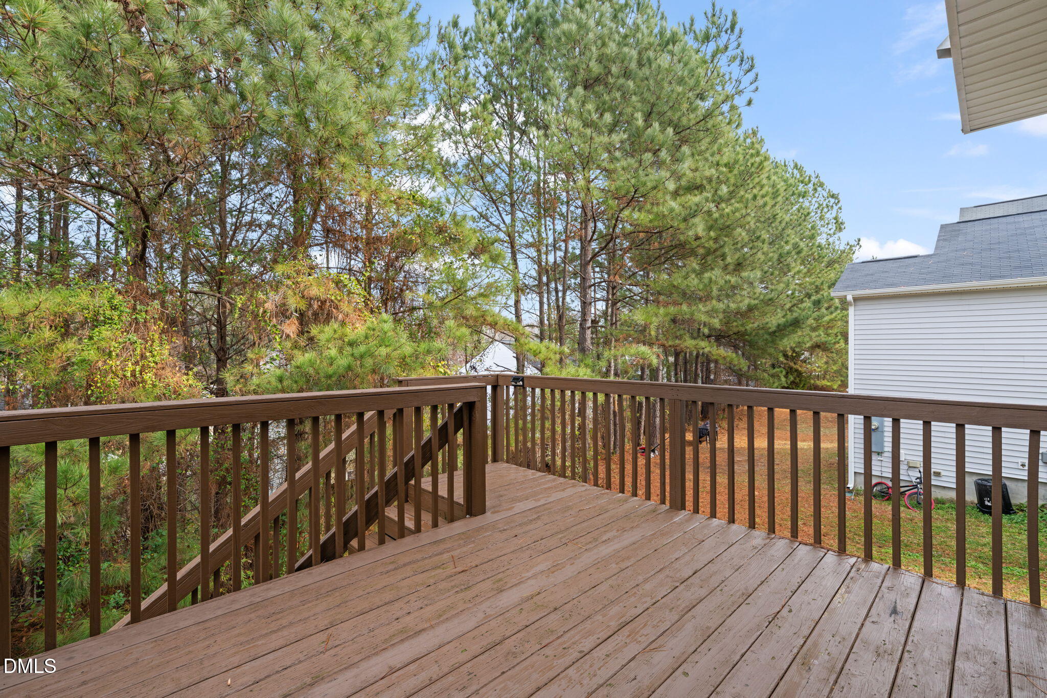 5841 Wynmore Road Raleigh, NC 27610 - Photo 33 of 40 a view of balcony with wooden floor and fence