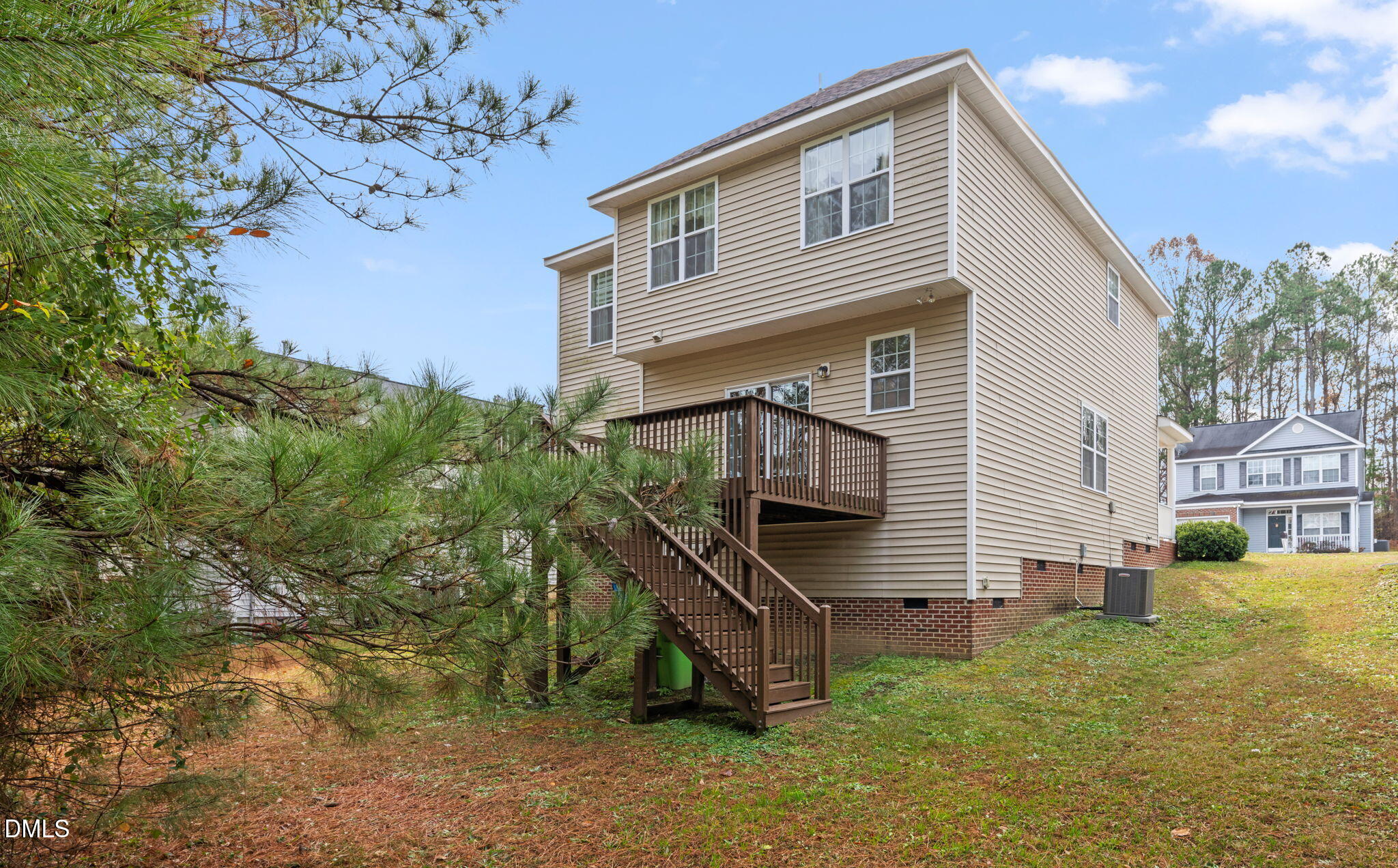 5841 Wynmore Road Raleigh, NC 27610 - Photo 34 of 40 a front view of a house with a yard