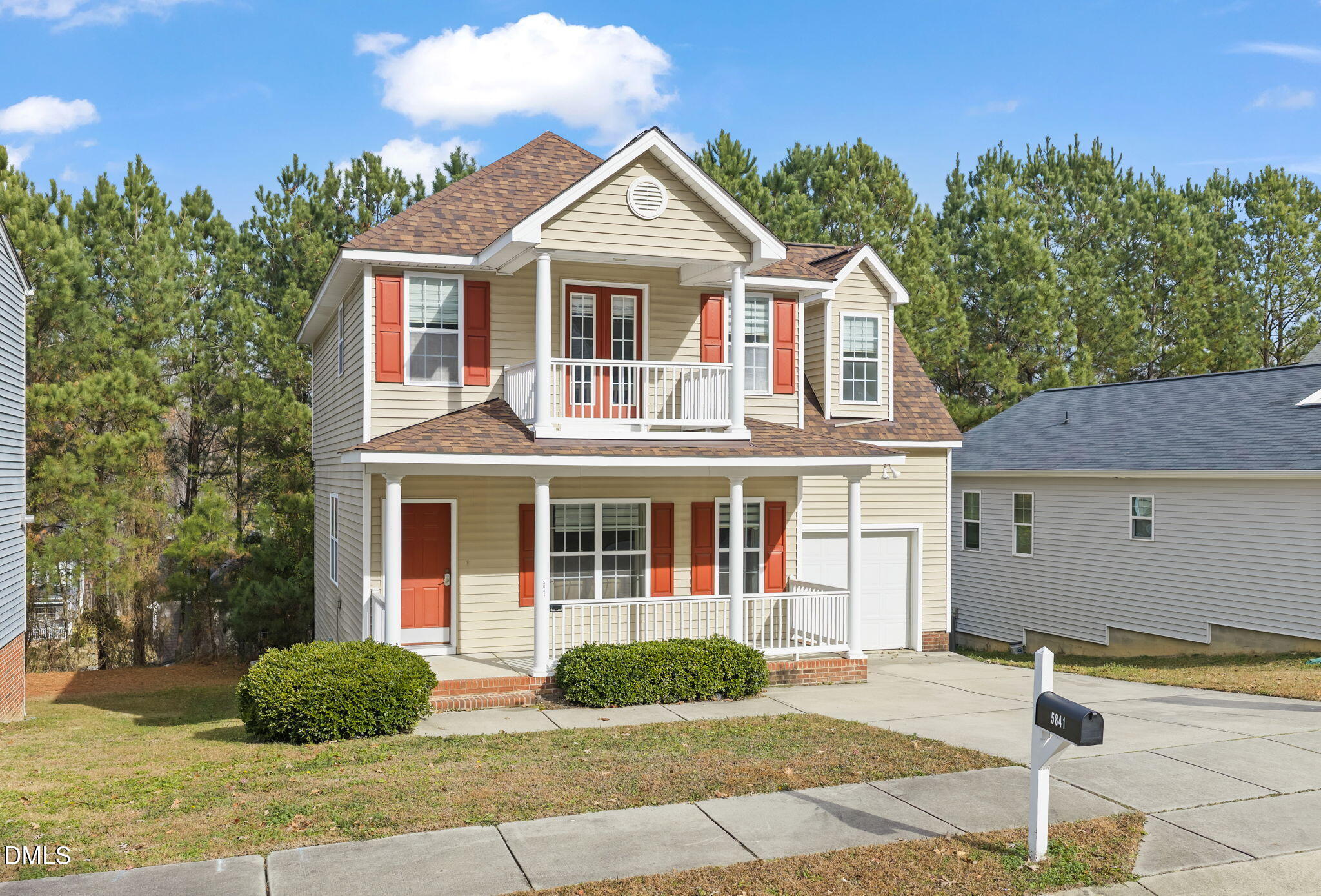 5841 Wynmore Road Raleigh, NC 27610 - Photo 37 of 40 a front view of a house with a garden