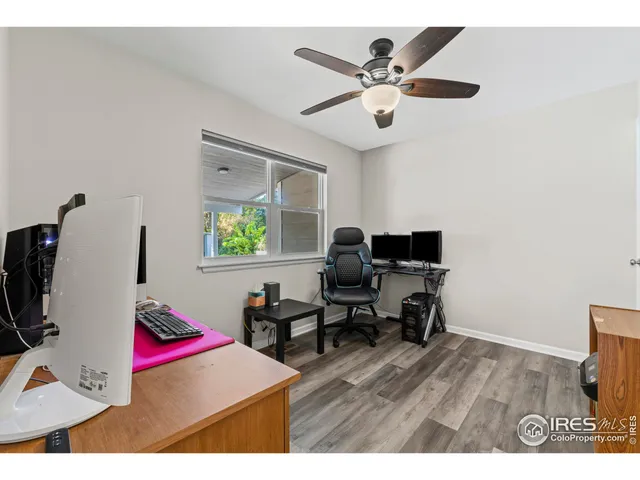 a workspace with furniture and window